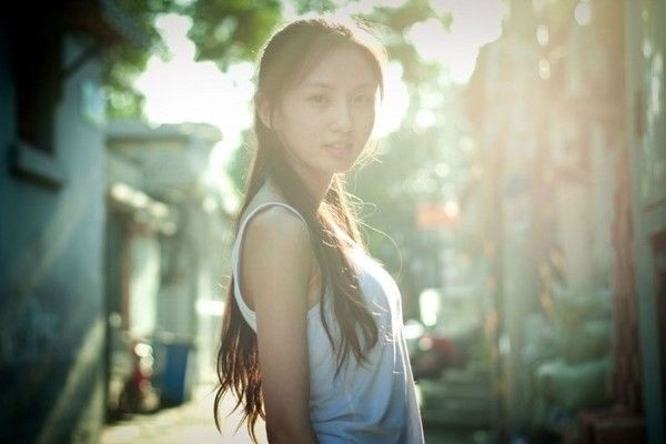 这组照片的上传者李洋阳是个"码农"代码女