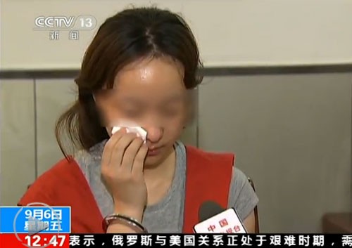 组图:"美女高管"陈怡看守所内讲述外逃详情